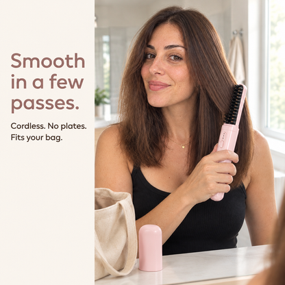 Woman smoothing her hair with the Quiet Gloss cordless brush